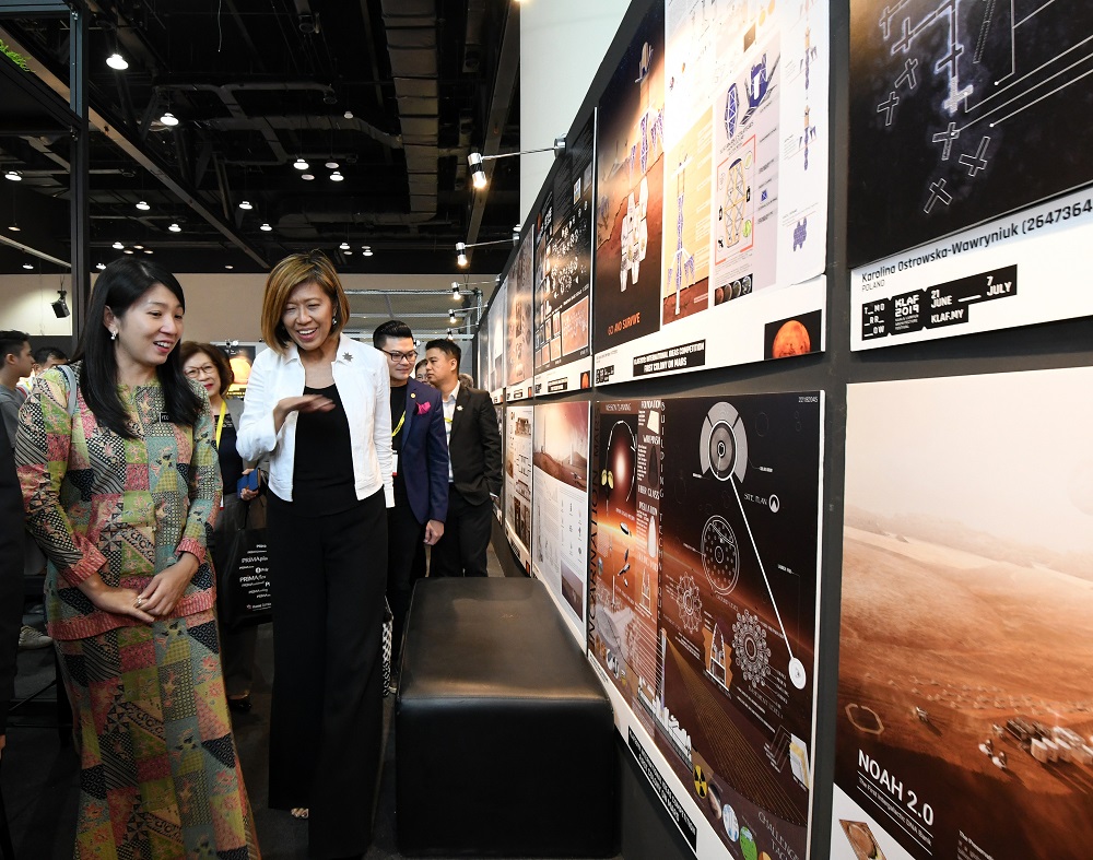 Yeo (left) and Tay viewing PAM’s ‘Tomorrowland’ pavilion.