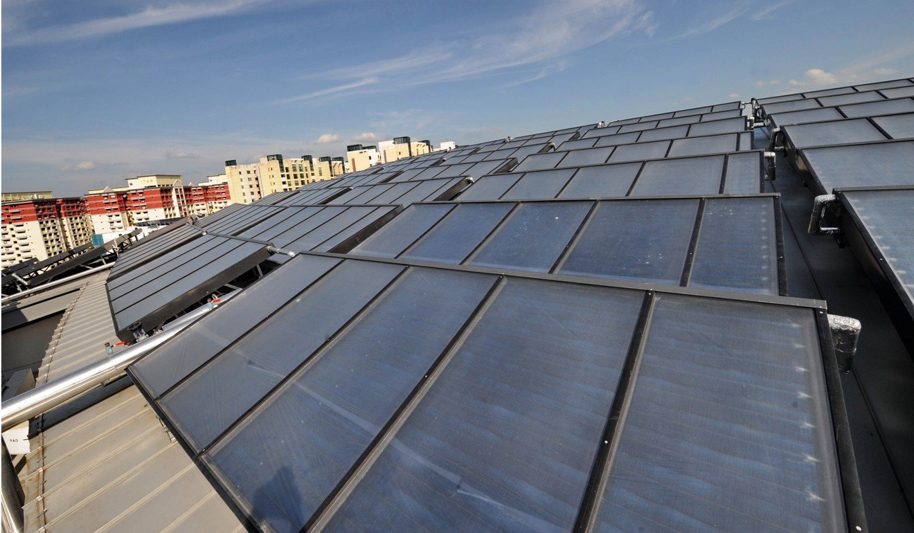 Solar panels on the roof top of the United World College Southeast Asia in Singapore. The country is building up its solar power coverage and by the end of the year will have panels on half of its public housing flats. Photo: AFP